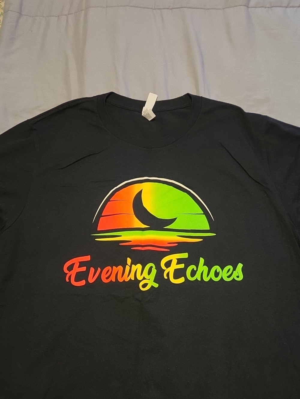 Evening ECHOES Black Tee with Red-Orange-Yellow-Green Gradient Sunset Graphic